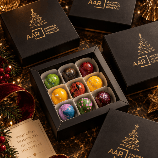 Chocolates festivos de lujo con identidad dorada Sello 9 navidad · Bombones personalizados para empresas